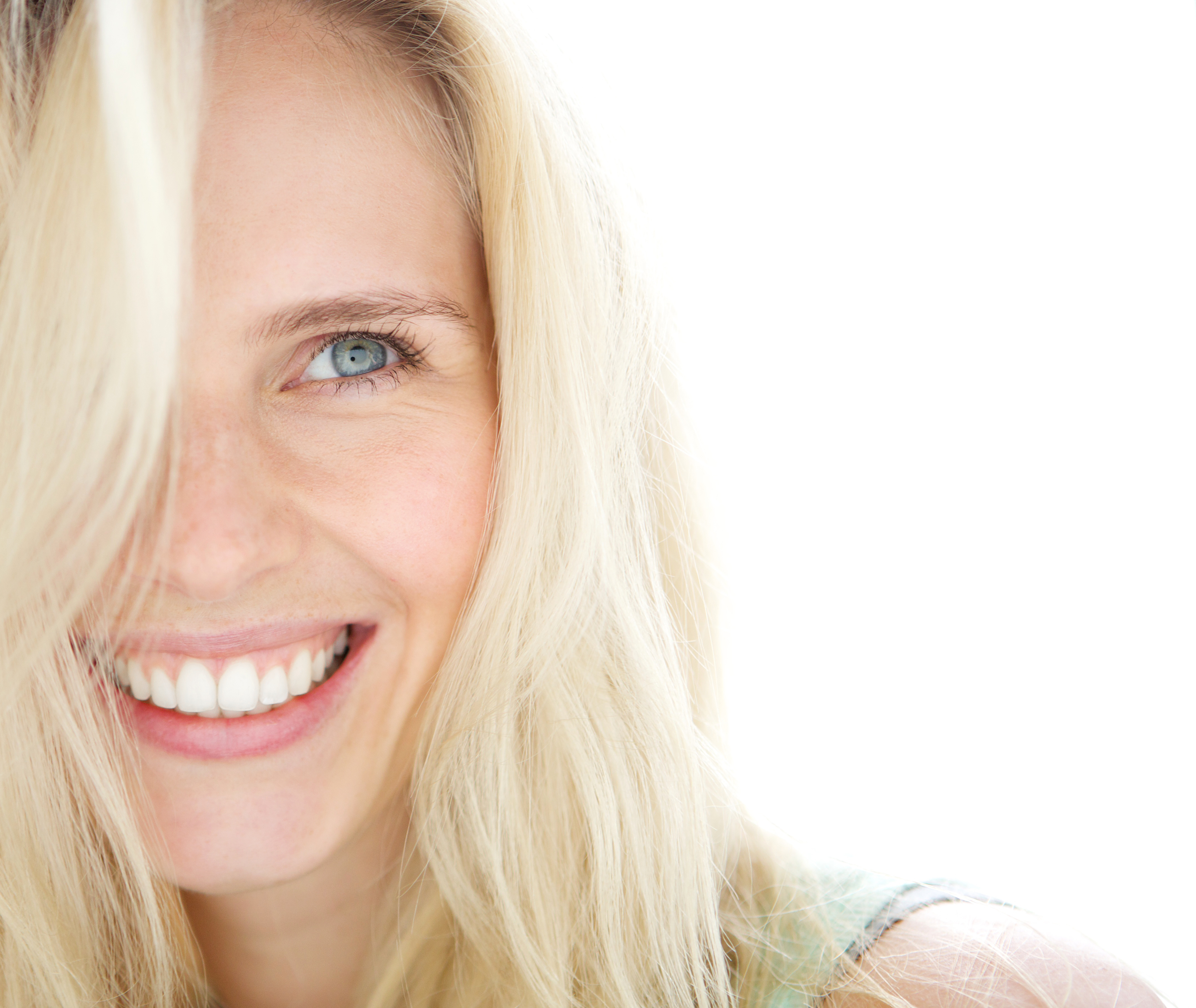 A woman with blonde hair smiling for the camera.